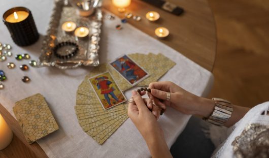 high-angle-woman-reading-tarot (2)
