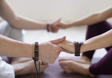 spiritual-young-man-woman-practicing-yoga-indoors (2)
